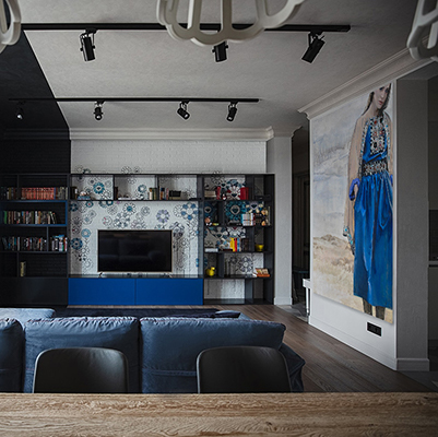 Girl in a blue dress — in interior