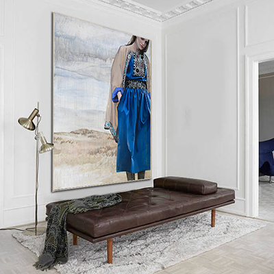 Girl in a blue dress — in interior
